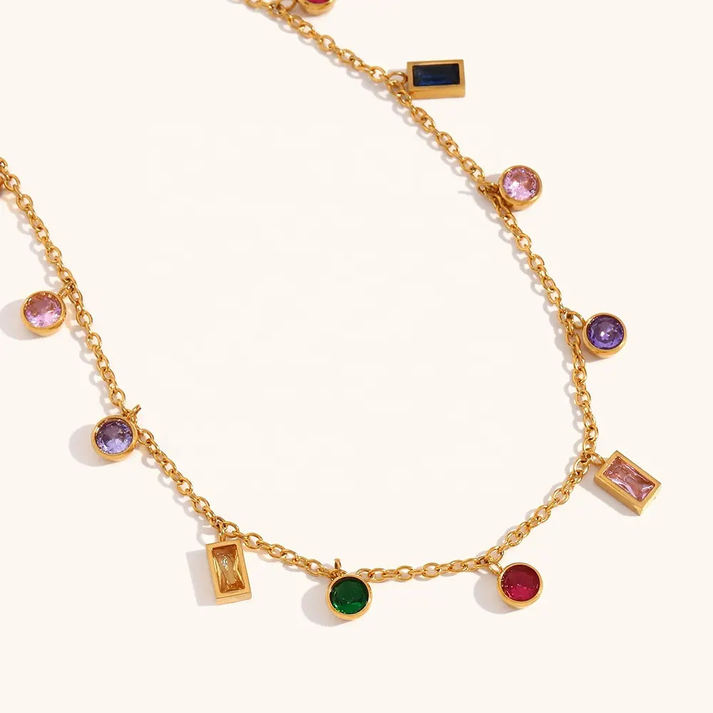 Fun Rainbow Charm Necklace Bracelet with 18K gold-plating, featuring colorful gemstone charms for a lively, standout look.