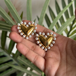Romantic heart-shaped earrings with pearl detail and gold finish, waterproof and hypoallergenic, great for gifting
