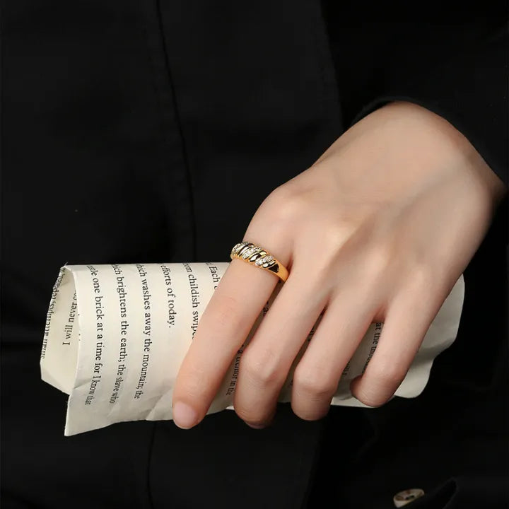 Elegant sculpted Golden Wave Statement Ring with crystals, 18K gold-plated, adjustable for a perfect fit and standout style.