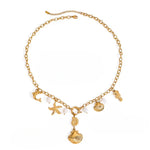 Seahorse starfish shell pendant necklace in 18k gold, ocean-inspired design perfect for beach lovers and everyday elegance