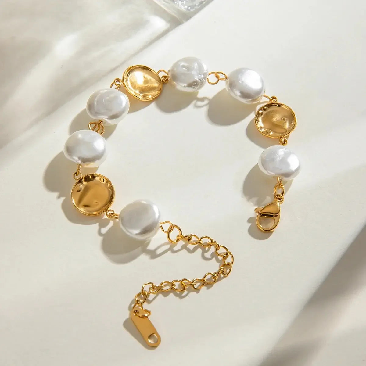 Sophisticated Seamless Circle Imitation Pearl Bracelet, 18K gold-plated with continuous ivory pearls for a refined, timeless style.