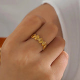 Adjustable gold ring with seashell design, perfect for adding beachy charm and coastal elegance to everyday outfits
