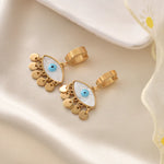 Gold-plated shell evil eye drop earrings with blue charm, lightweight and stylish for everyday wear and protection.