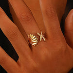 Stylish Gold Starfish Shell Ring with 18K gold plating, adjustable and perfect for adding a coastal touch to your daily style.