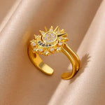 Adjustable 18k gold plated ring with cosmic sun and moon design, ideal for stylish celestial jewelry lovers.
