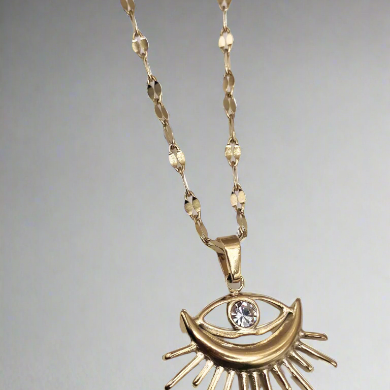 Elegant Sunburst Evil Eye Pendant Necklace, 18K gold-plated with a sparkling rhinestone center, offering charm and protection for any occasion.
