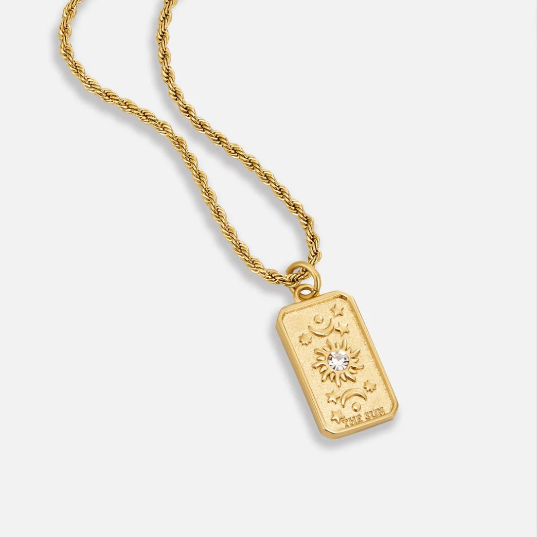 Sun Tarot Card Pendant Necklace in gold with cubic zirconia, designed to inspire joy, peace, and positive energy.