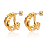 Elegant Triple Hoop Gold Earrings, 18K gold-plated, featuring a sleek layered design for a modern yet sophisticated look.