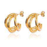 Elegant Triple Hoop Gold Earrings, 18K gold-plated, featuring a sleek layered design for a modern yet sophisticated look.