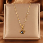 Turkish blue evil eye necklace with gold-plated chain, symbolizing protection and good luck, stylish and meaningful jewelry for everyday wear.