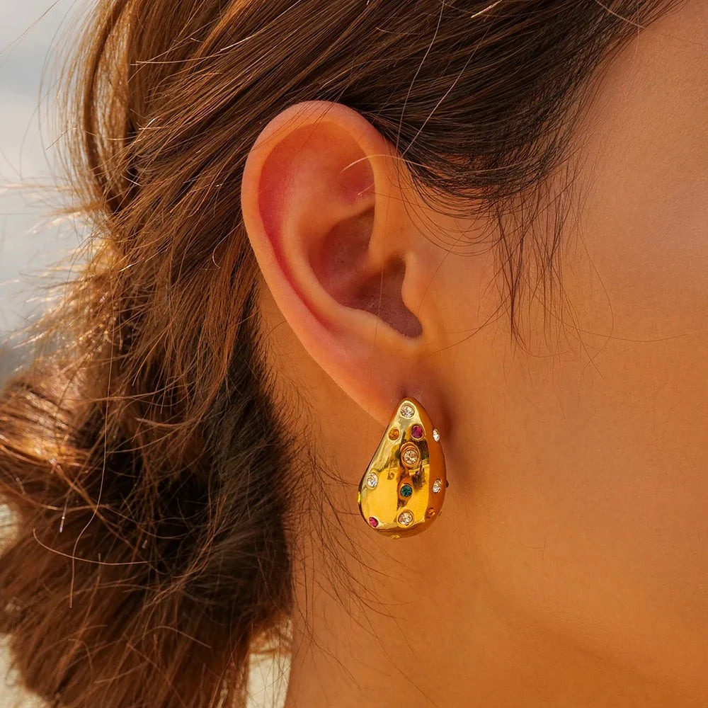 Vibrant teardrop earrings with multicolor gemstones and gold-plated finish, perfect for adding a playful touch to any look