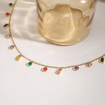 Vibrant Rainbow Charm Necklace Bracelet, 18K gold-plated with colorful gemstone accents, perfect for layering or wearing solo for a bright look.
