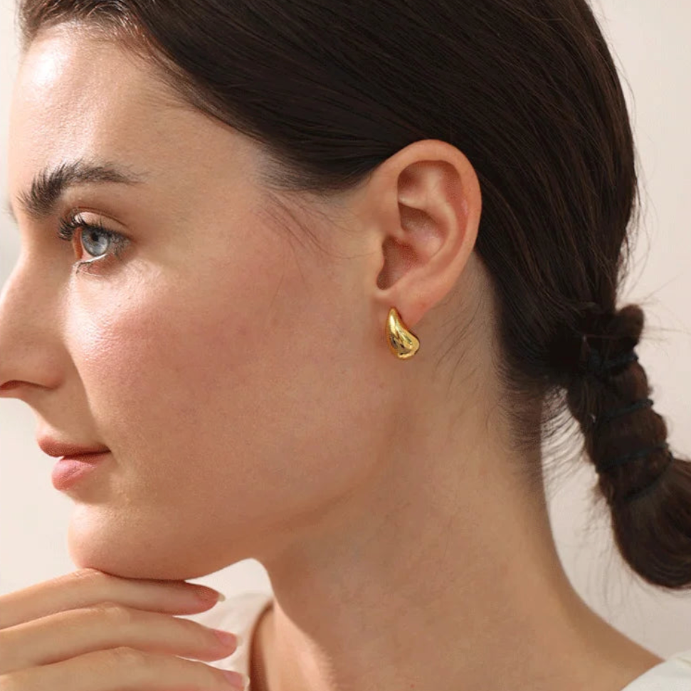 Gold-plated water drop earrings with a sleek design, perfect for adding modern elegance to any outfit for everyday wear.