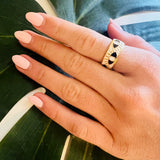 Adjustable white enamel ring with gold-plated finish and bold blue evil eye design for everyday protection and style